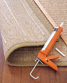 rug with caulk strips